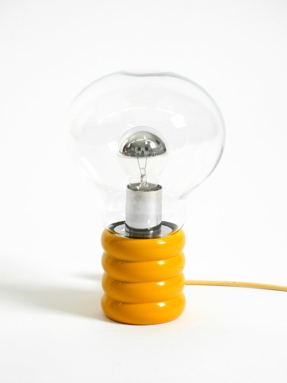 Image 1 of Very rare original 1960s Space Age "Bulb" wall lamp by Ingo Maurer in yellow with a clear glass shade