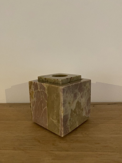 Sturdy vintage marble candlestick in cube shape.