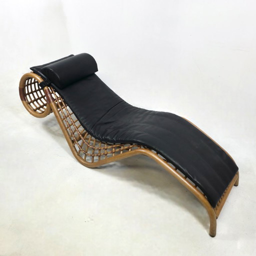 Chaise longue Flechtatelier Schütz en rotin et cuir. Design des années 70.