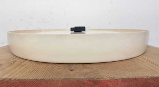 Image 1 of Grande orologio da parete industriale in bachelite di Pragotron, anni '60