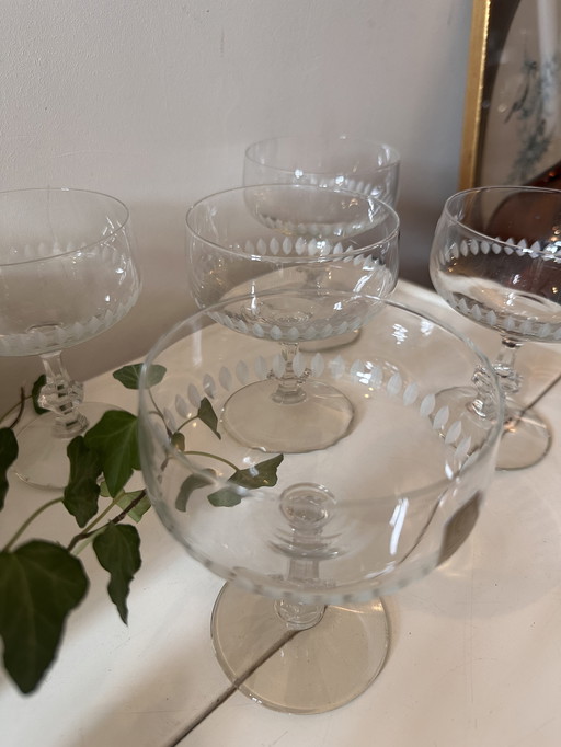 Set of 5 crystal coupe champagne glasses