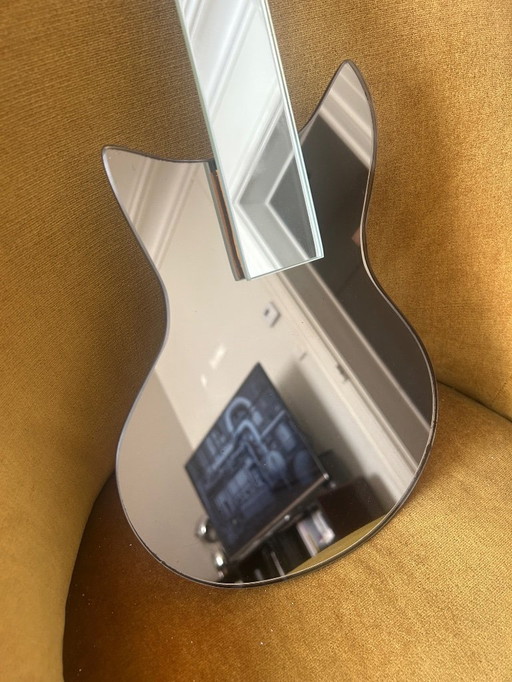 Gitaarspiegel uit de jaren 70