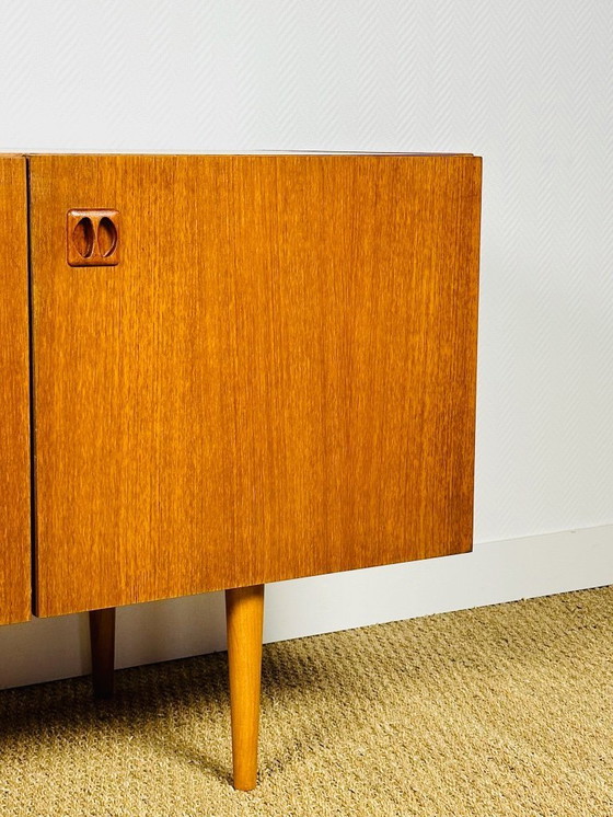 Image 1 of Scandinavian teak sideboard with 4 doors and tapered legs, 1960