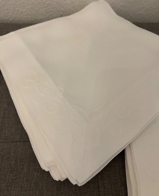 Image 1 of 12 tovaglioli ricamati a mano Eri Textiles