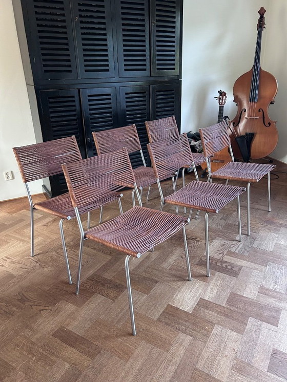 Image 1 of Conjunto de 6 sillas de diseño Bonacina Miss B en piel y acero inoxidable