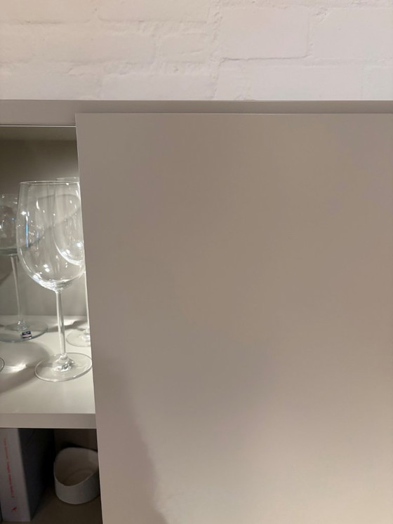 Image 1 of Interlübke Studimo TV wandkast met schuifdeuren