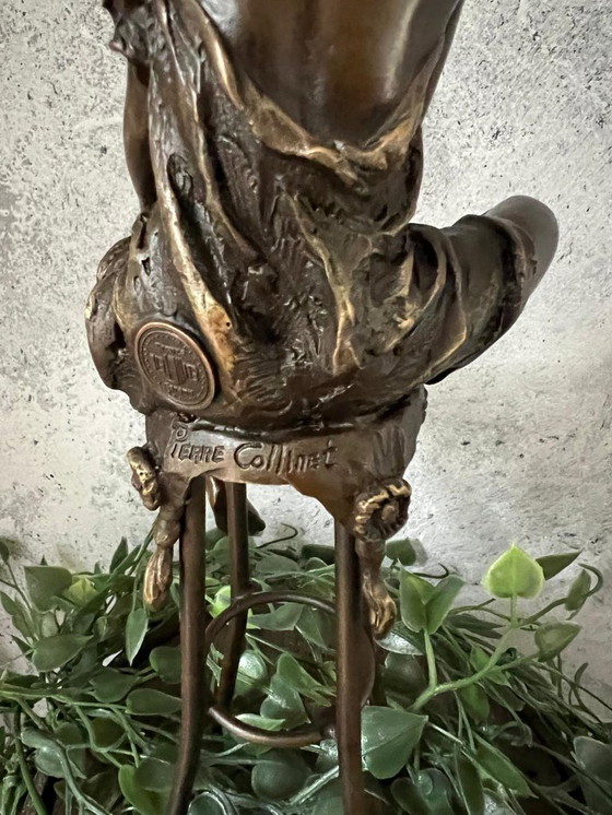 Image 1 of Bronze statue of a woman on a stool