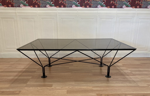 Glass and metal design coffee table.