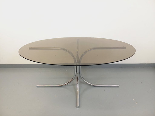 Vintage oval dining table in smoked glass and chrome metal, Space Age style, from the 70s