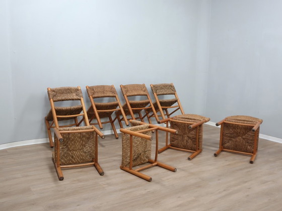 Image 1 of Juego de 8 sillas estilo Charlotte Perriand de los años 60, de paja tejida y madera.