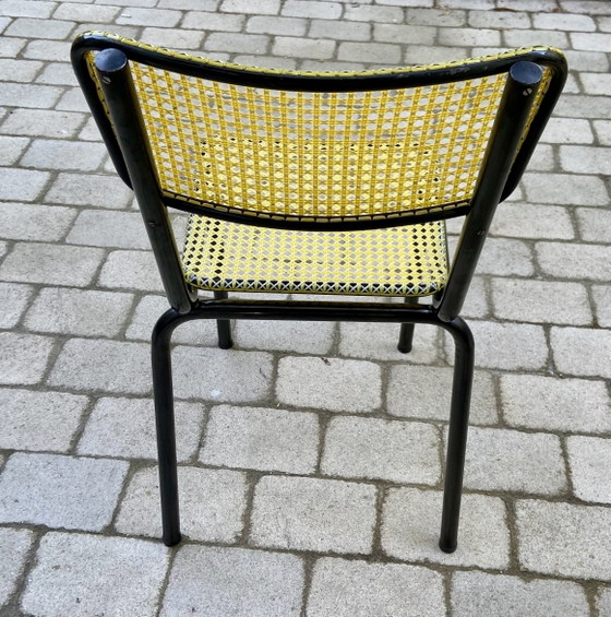 Image 1 of Een paar Art Prog-stoelen – Geel geweven plastic en zwart staal – Frankrijk, jaren 1950