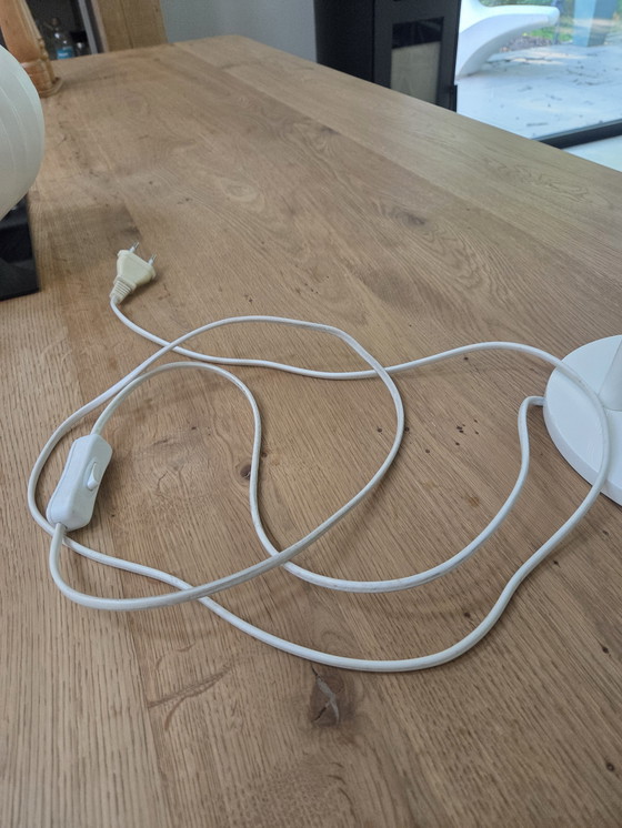 Image 1 of La lampada da scrivania Flos Tab T LED è stata progettata da E. Barber & J. Osgerby.