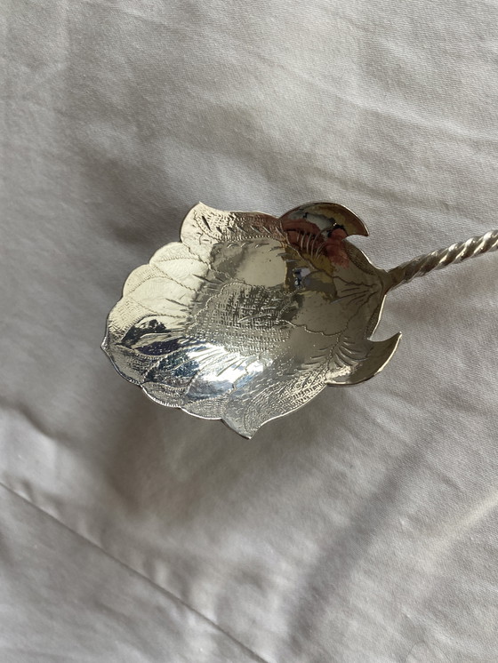 Image 1 of Silver djokja sugar spoon with wajang doll, Indonesia, 800