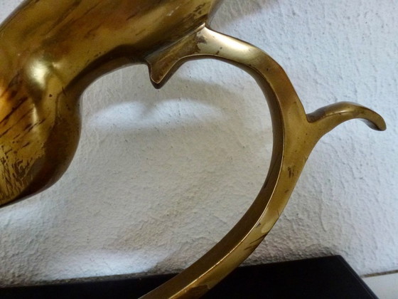 Image 1 of Beautiful brass gazelle on a lacquered wooden base.
