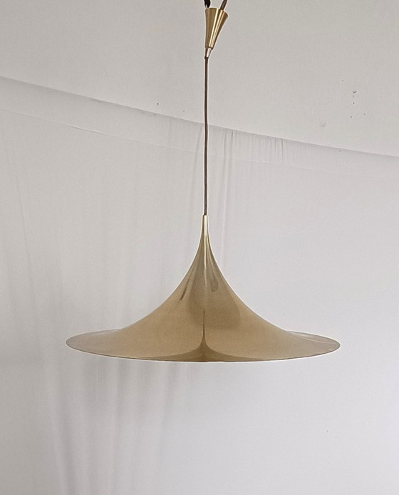 Image 1 of Fog & Morup witch hat lamp in gold color from 1968