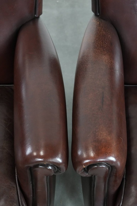 Image 1 of 2 x Schaffellsessel mit zeitlosem Look und wunderschönen dunklen Farben