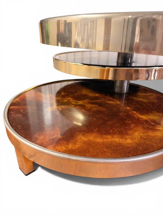 Image 1 of Draaibare salontafel met 3 planken van iepenhout met wortelknol - Maria Pergay