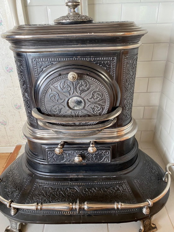 Image 1 of Antique cast iron stove with hearth set and bellows