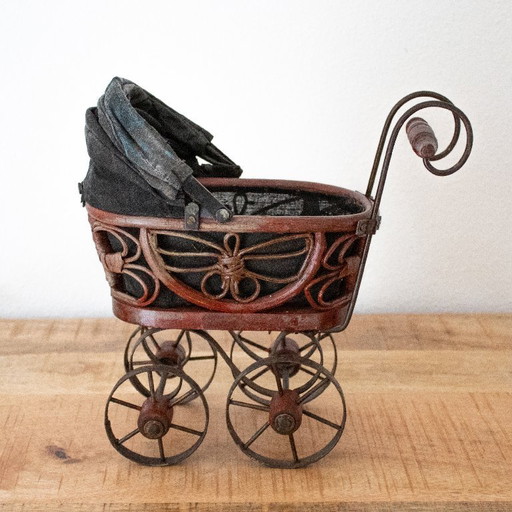 Antique Victorian-style doll pram