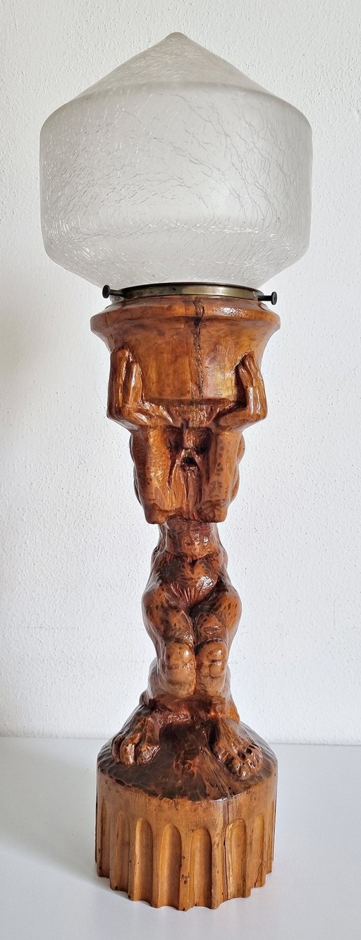 Folk art wooden sculpture lamp with crackled glass