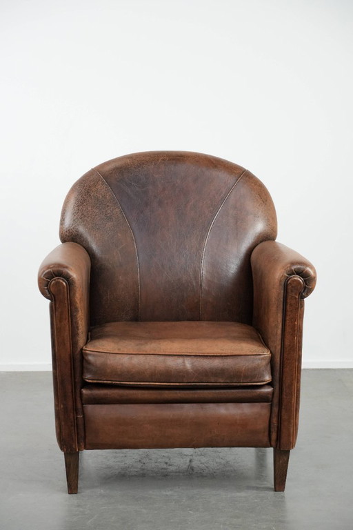 Mooie vintage schapenleren fauteuil/armchair met warme kleuren