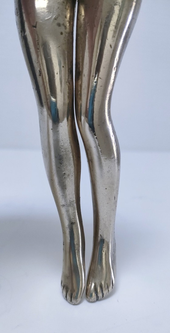 Image 1 of notenkraker vrouwenbenen vintage massief messing