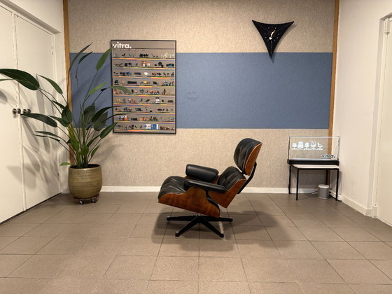 Image 1 of Herman Miller / Contura | Charles & Ray Eames | Lounge Chair & Ottoman | Rosewood & Black Leather | 1x Set