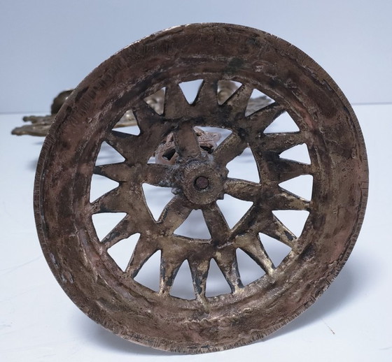 Image 1 of Kandelaar met pauwenmotief en wielen, massief messing