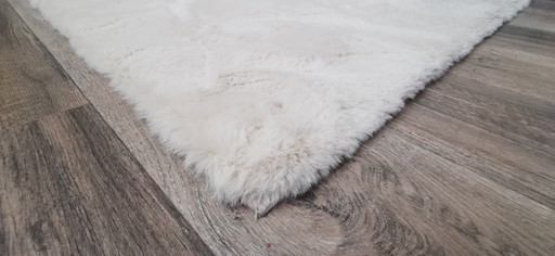 Superzacht beige tapijt