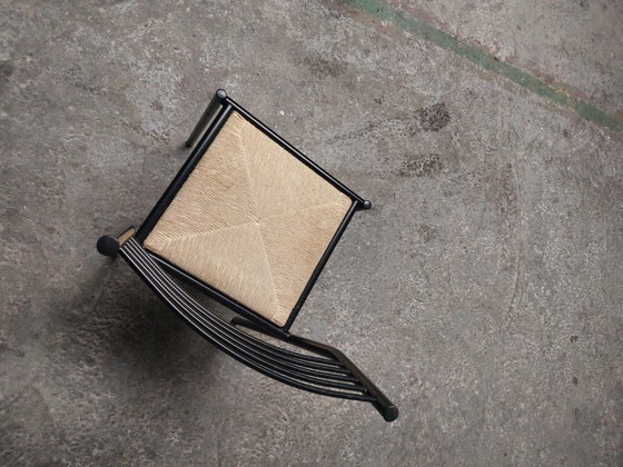Image 1 of 4 chaises en métal avec assises en osier