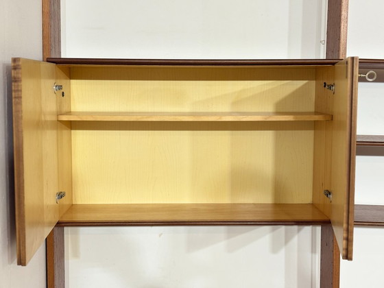Modular mid-century wall shelf by interna-Peter Pedrides / Teak shelving system 1960s – Shelving unit, Wood (photo 5 of 27)