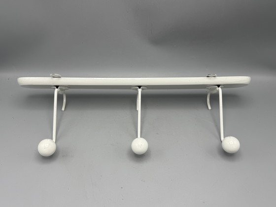Image 1 of Mid - Century coat rack sleek and timeless design
