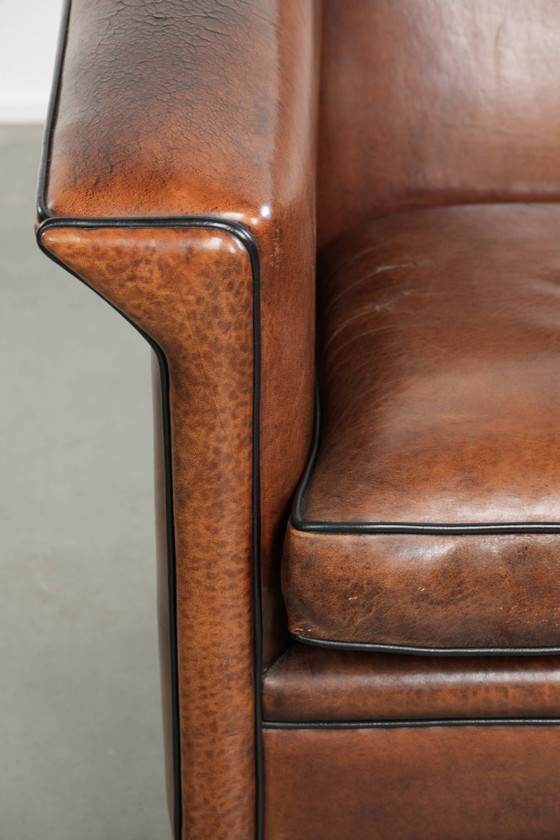 Image 1 of Strakke schapenleren Art Deco design armchair/ fauteuil met zwarte biezen en een prachtige warme kleur