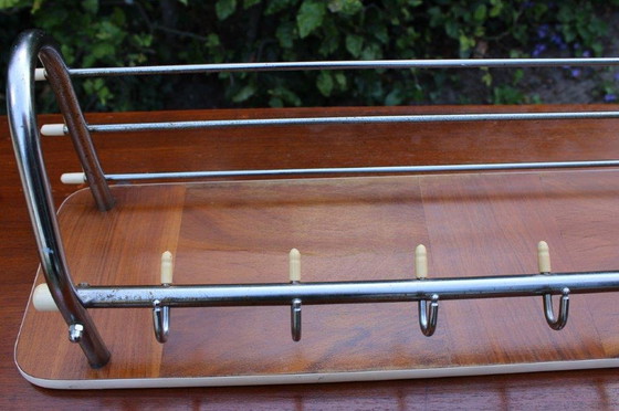 Image 1 of Vintage 60s/70s coat rack with chrome and wood