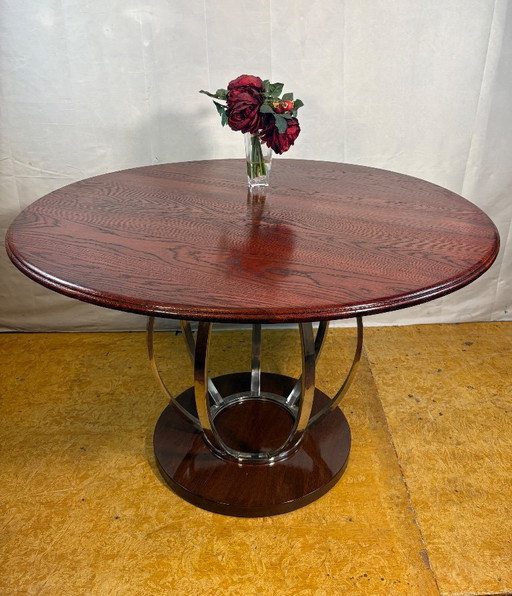 Vintage ronde eettafel in art-decostijl – eikenhouten blad en chromen onderstel – designgeïnspireerd. Breng tijdloze elegantie i
