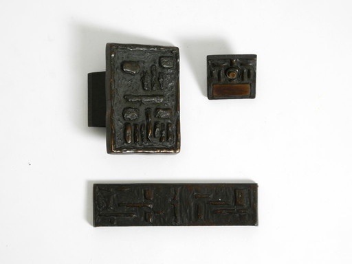 A set of solid, heavy 1970s Brutalist pull handles with letter slot and doorbell, made of bronze by Alpan Germany