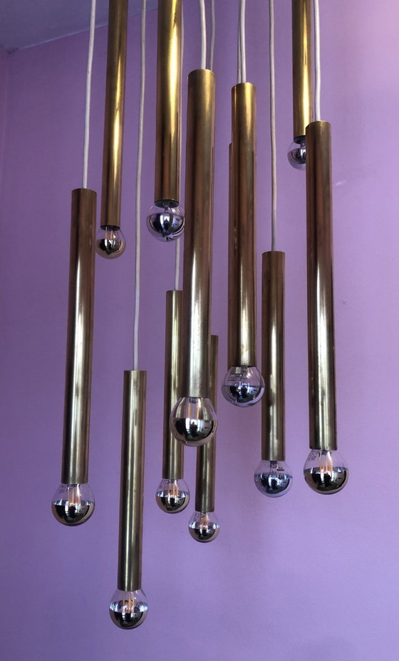 Image 1 of Lustre en laiton à 12 points lumineux.