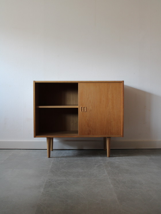 Image 1 of Vintage Danish sliding door cabinet in oak