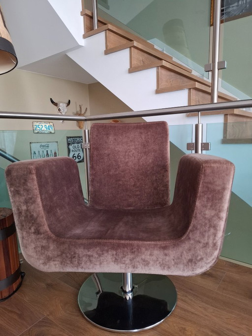 Sillón giratorio de mediados de siglo con diseño espacial