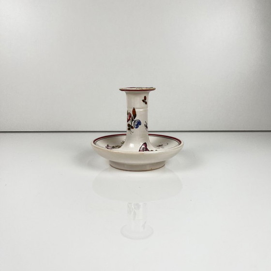 Image 1 of Handbeschilderde keramische kaarsenhouder met bloemenmotief.