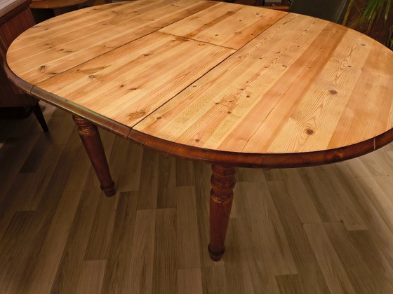 Image 1 of Extendable dining table round & oval