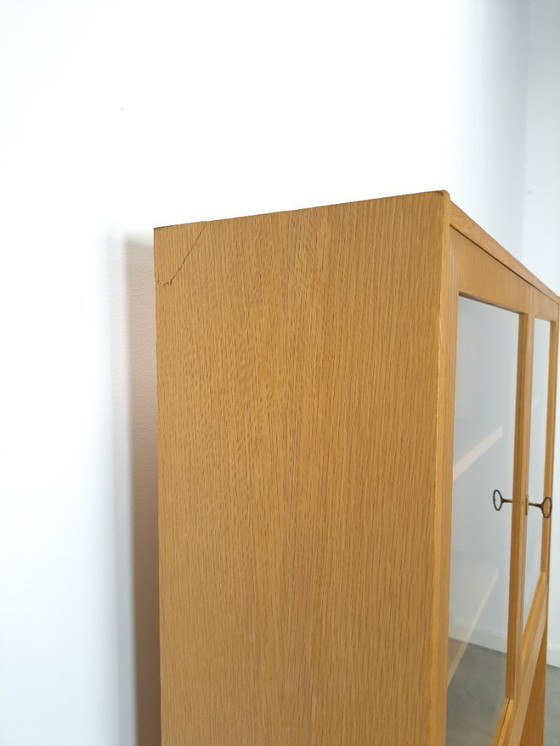 Image 1 of Tall LP display case with glass doors and reading shelf from Sweden