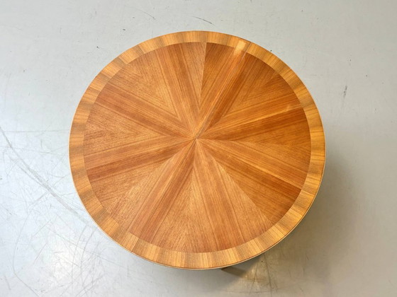 Image 1 of Tavolo rotondo allungabile in legno di ciliegio con impiallacciatura a stella, anni '50