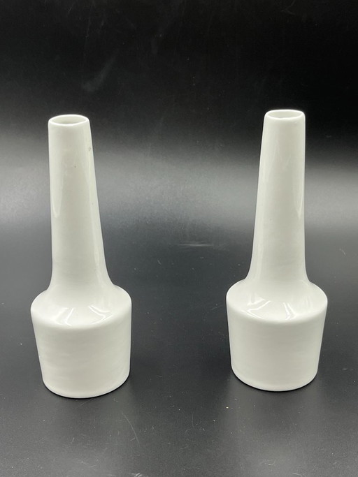 Pair of vintage white ceramic bud vases