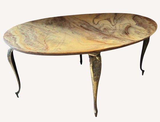 Image 1 of Mesa de centro ovalada con tablero efecto mármol