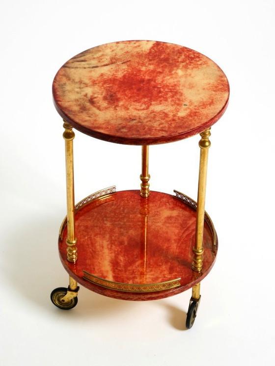 Image 1 of Round, small 1960s Aldo Tura serving or bar trolley in red goatskin leather | Made in Italy