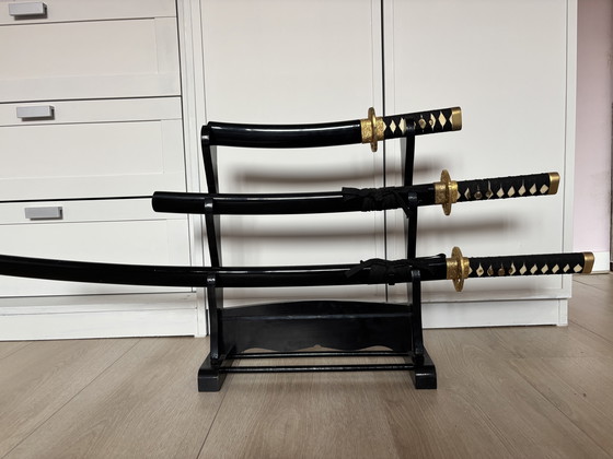 Image 1 of Decorative Daishō samurai sword set with wooden stand