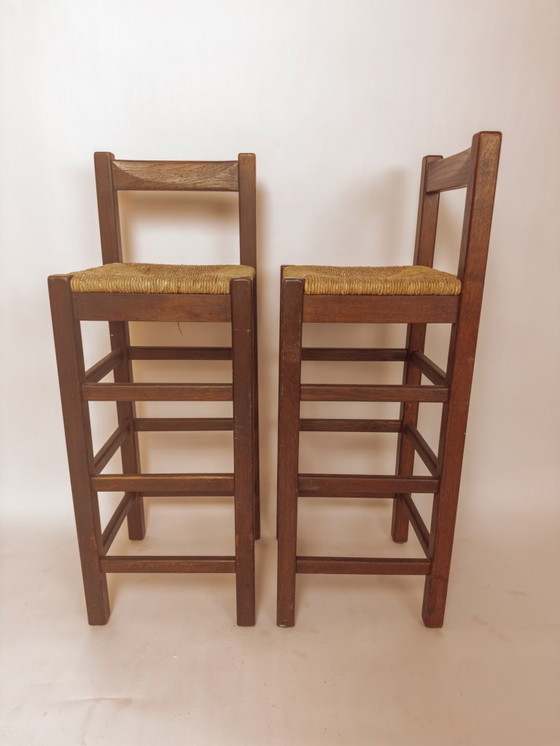 Image 1 of Ensemble de 2 tabourets de bar vintage en bois avec assise en jonc