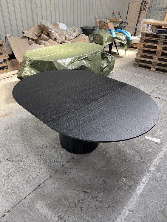 Image 1 of Round extendable dining table black oak
