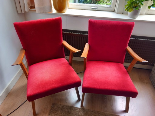 2 red retro chairs